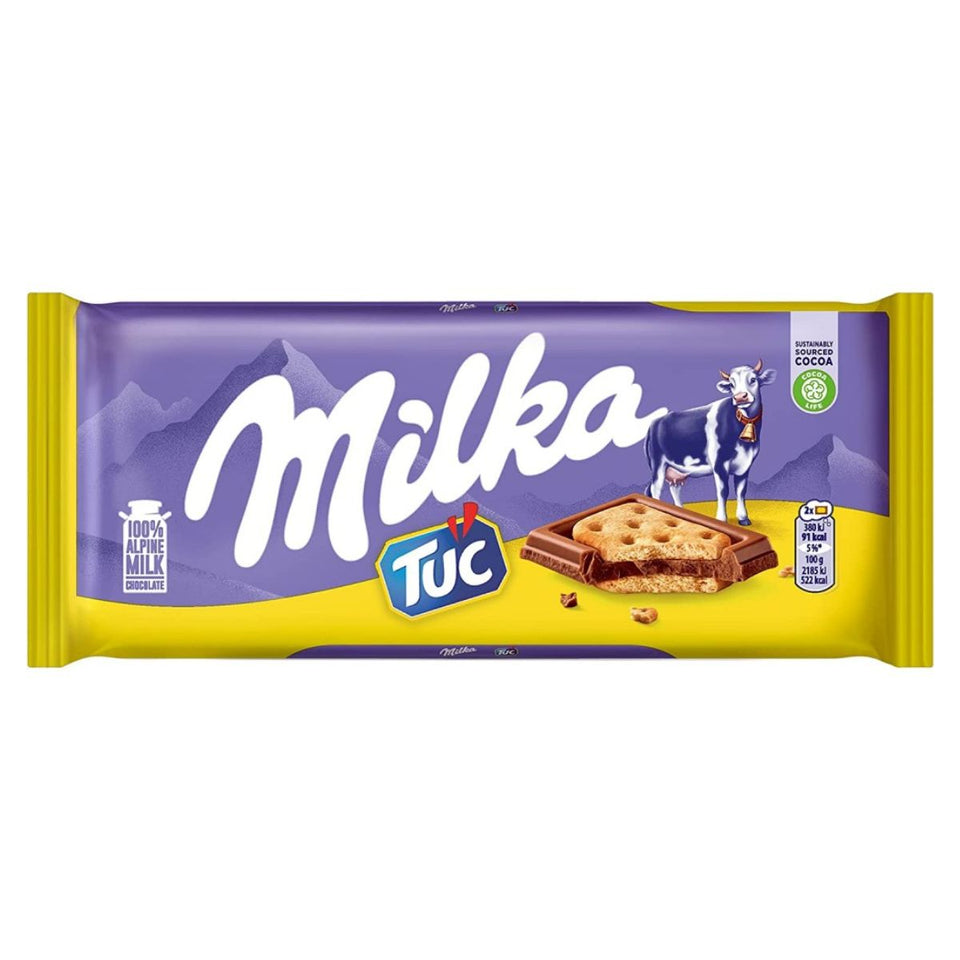 Packaging of Milka Chocolate Sandwich Tablet Tuc 87g showing the product name, an image of the chocolate bar with Tuc crackers on the front, and the Milka cow logo.