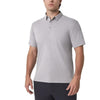 Man wearing a gray patterned polo shirt on a white background