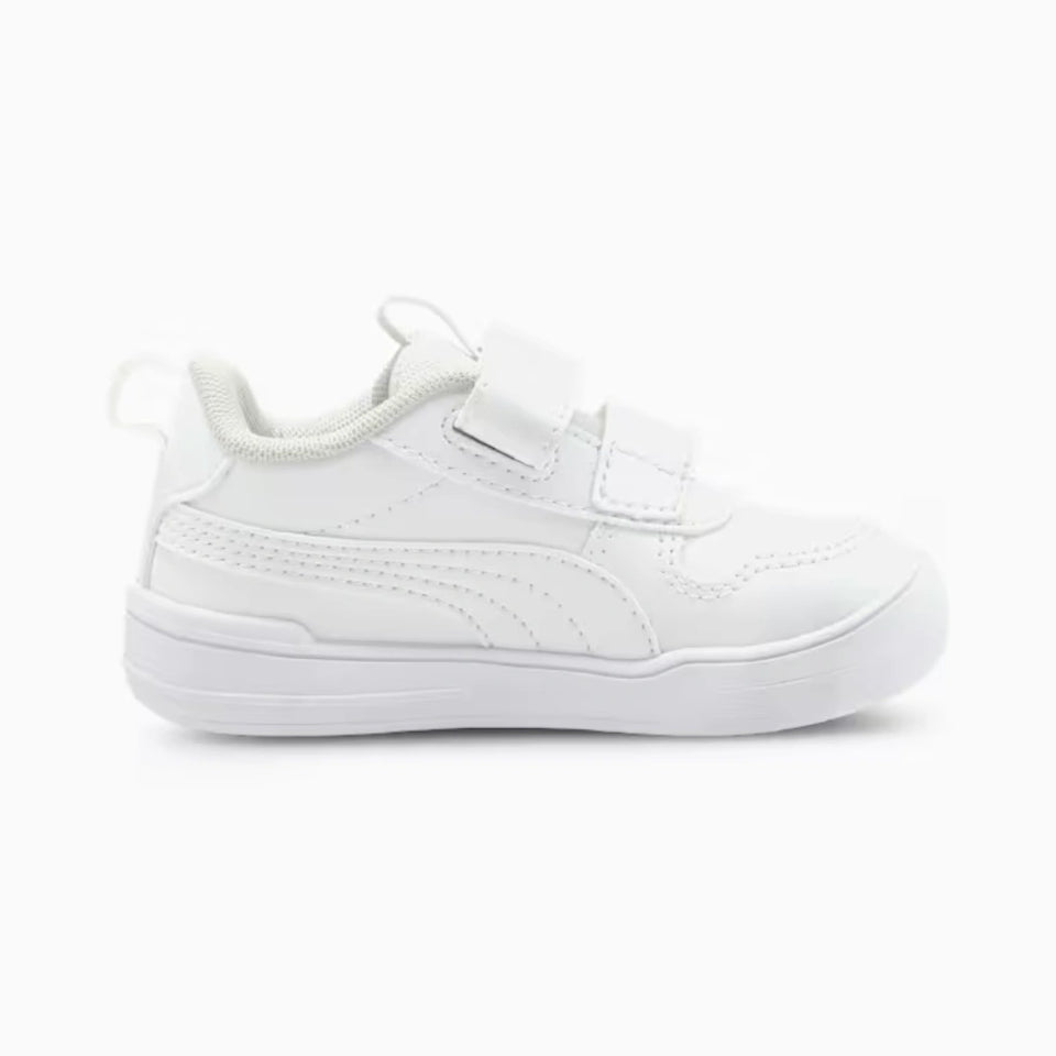 A white Puma kids' sneaker with a hook-and-loop strap closure, shown in a side profile on a light gray background.