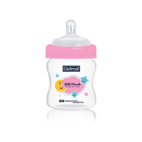 Baby bottle with pink nipple on a white background