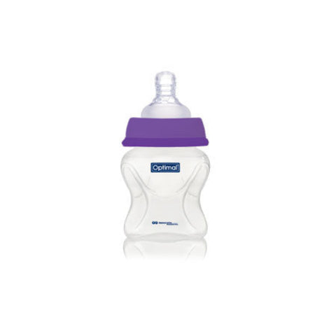 Baby bottle with purple cap on a white background