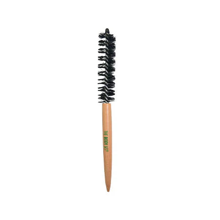 Brow brush with black bristles on a white background