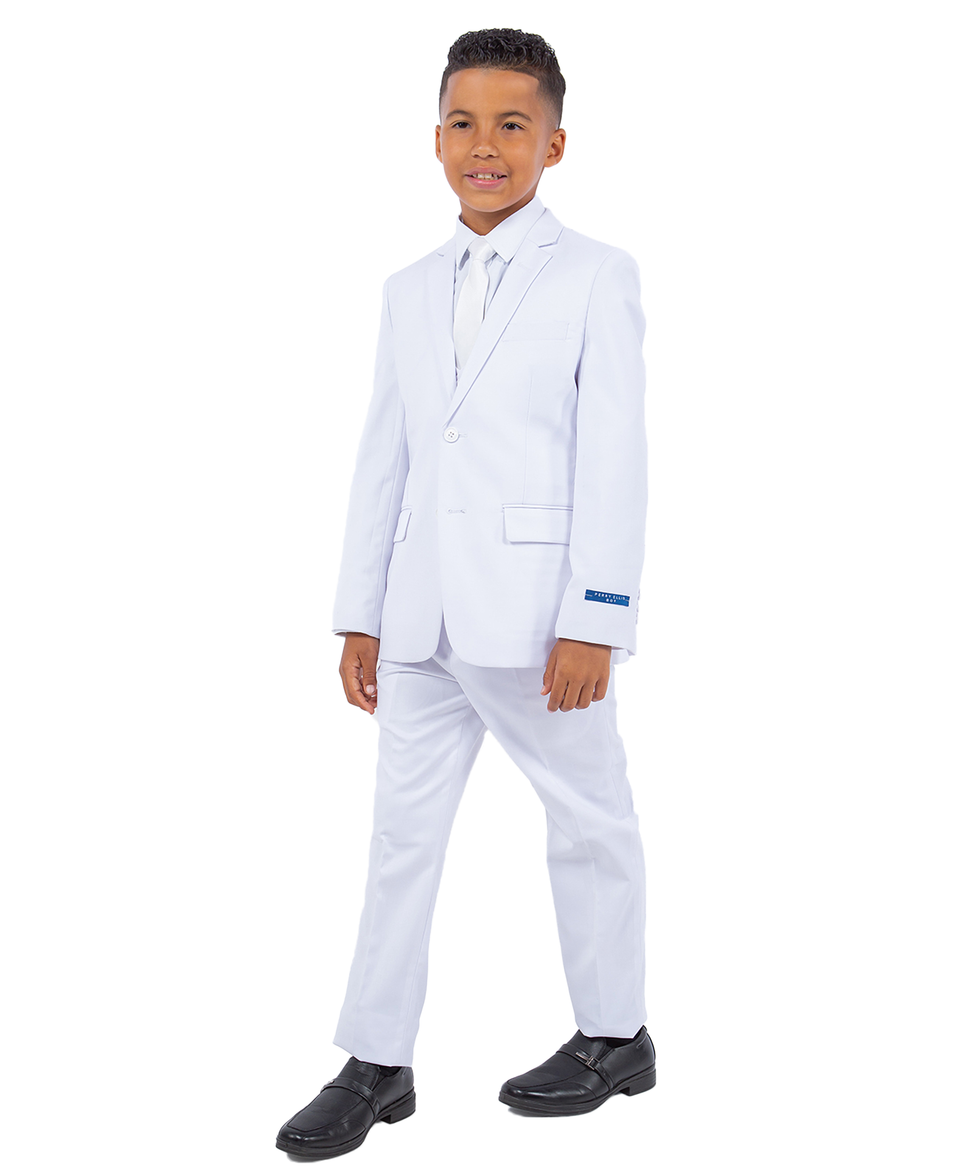 Young boy wearing a white suit on a white background