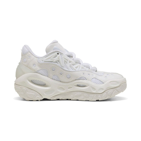 White sneaker with green accents on a white background