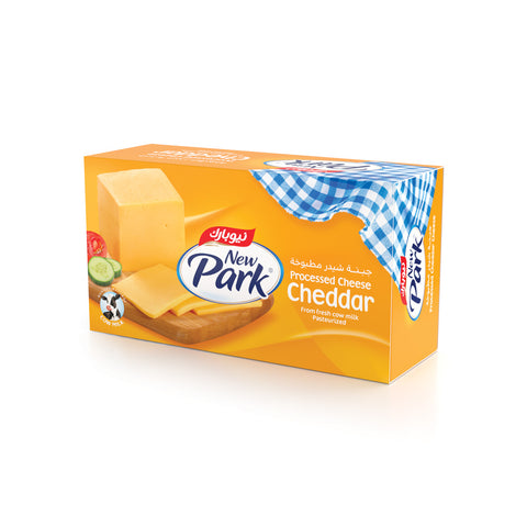Box of New Park Cheddar cheese on a white background