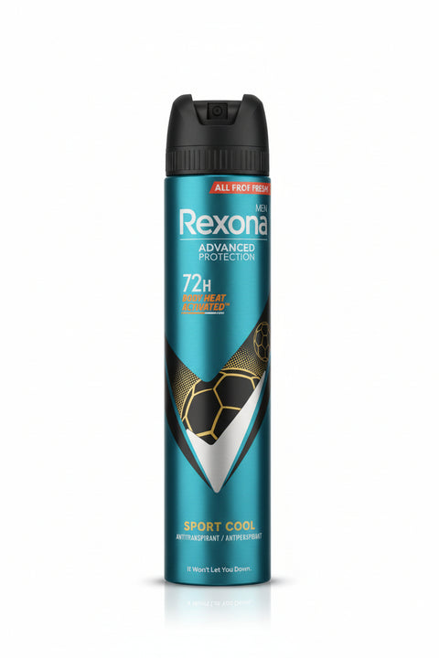 Rexona deodorant spray can on a cardboard surface with stacked boxes in the background