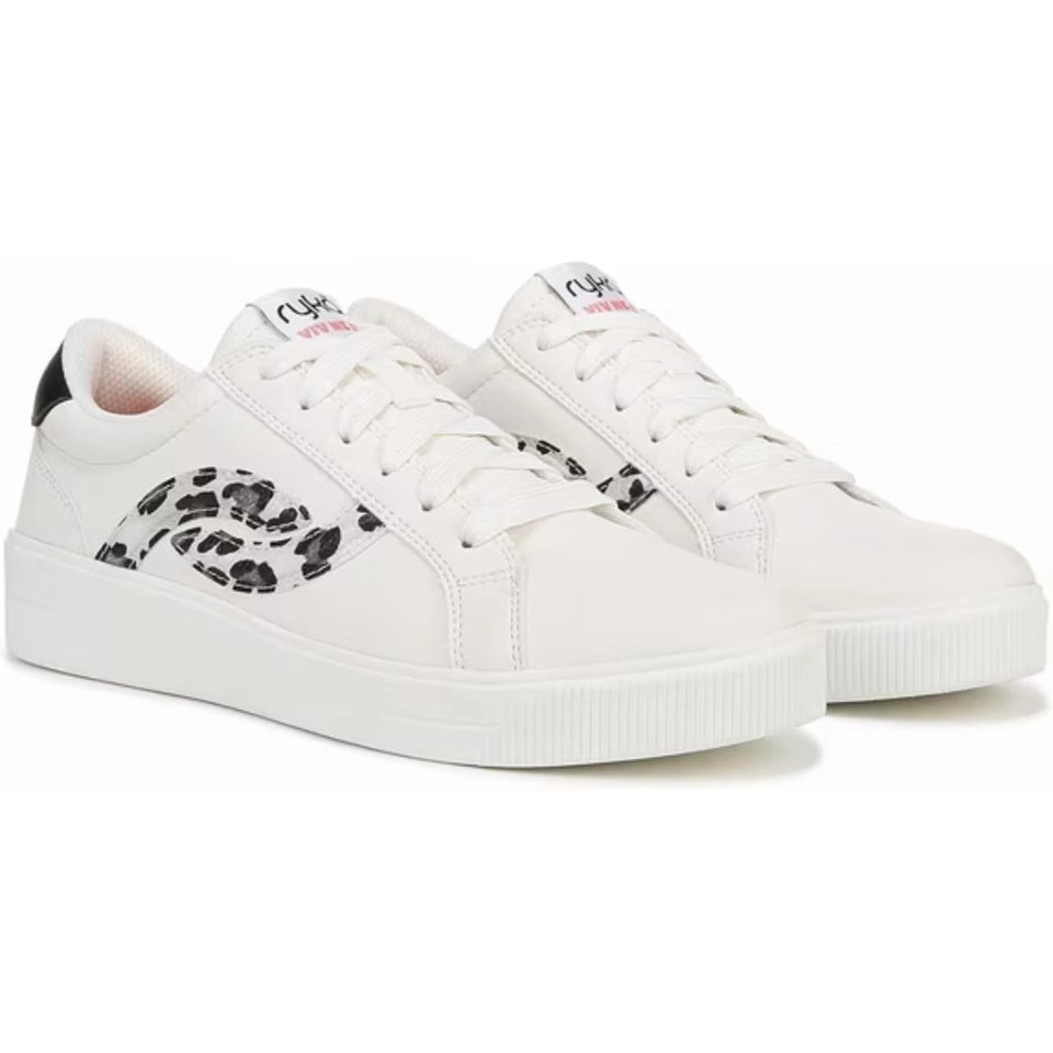 A pair of white low-top sneakers with black animal spot patterns on the sides, white laces, and white rubber soles, shown against a plain white background.