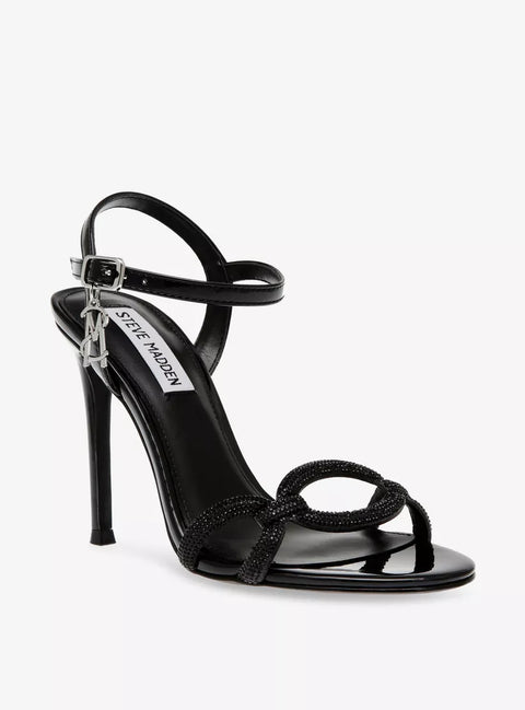 Black sandal with a high heel on a white background