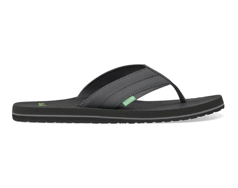 Black sandal with a green logo on a white background