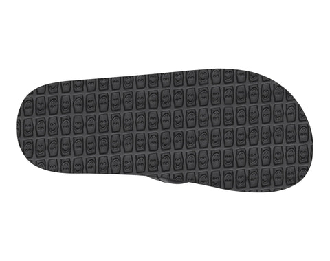 Black sole of a shoe with textured pattern on a white background