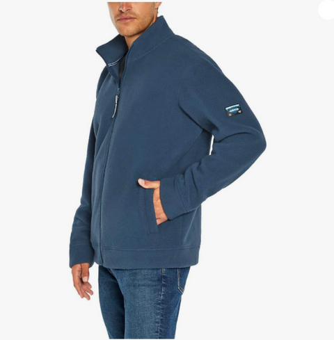Man wearing a blue fleece jacket with a brand logo on a white background