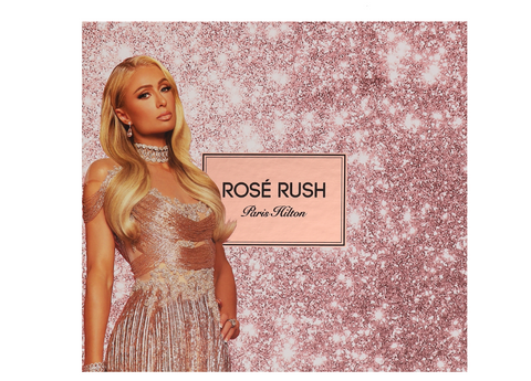 Promotional image of a woman in a sparkly dress with 'Rosé Rush' branding on a glittery background.