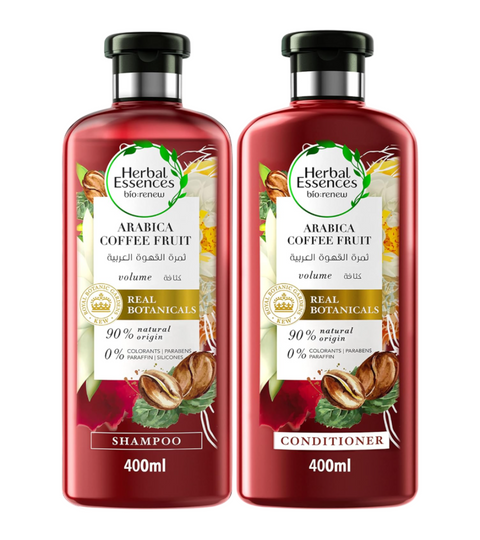 Two bottles of Herbal Essences Arabica Coffee Fruit shampoo and conditioner on a white background.