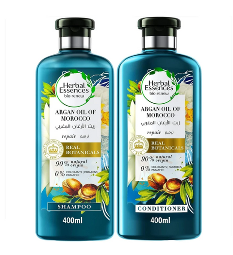 Two bottles of Herbal Essences Argan Oil of Morocco shampoo and conditioner on a white background.