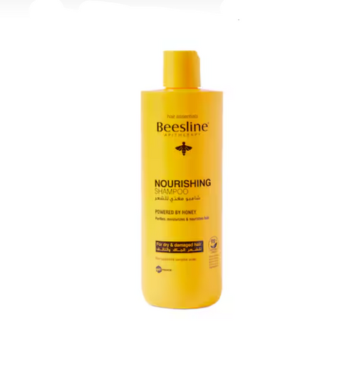 Yellow shampoo bottle with 'Beesline' branding on a white background