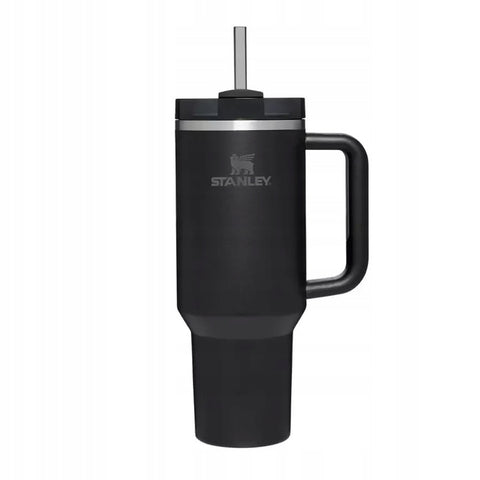 Black Stanley mug with handle and straw on a white background