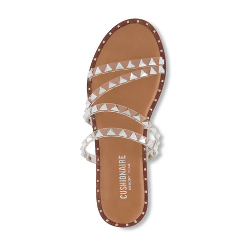 Brown sandal with white triangle patterns on a white background