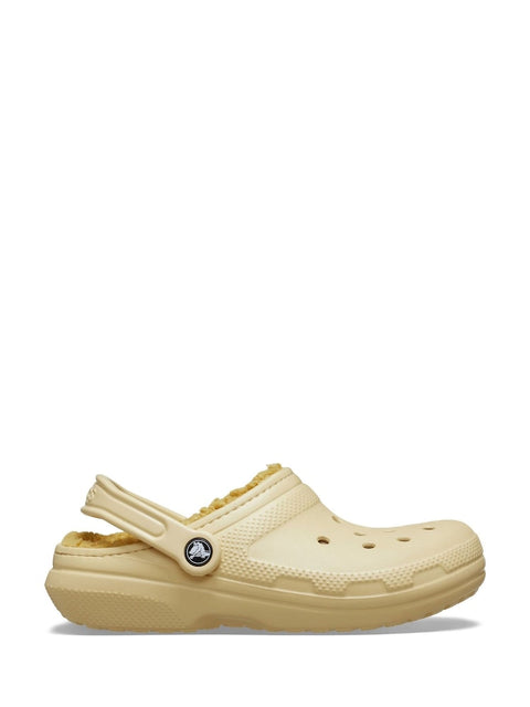 Beige clog shoe on a white background