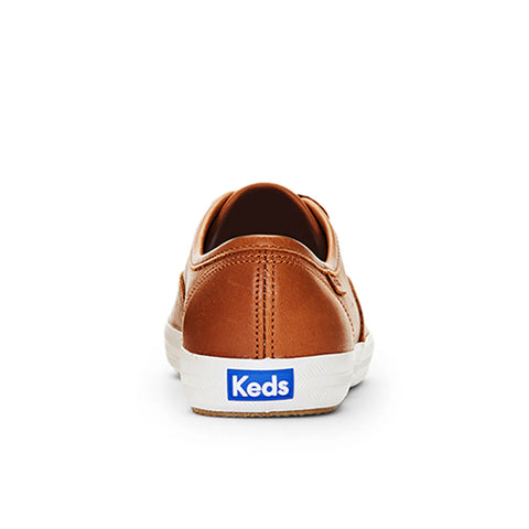 Brown Keds sneaker on a white background