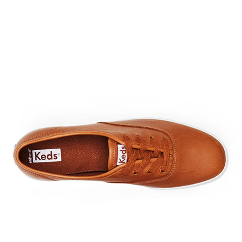 Brown Keds sneaker on a white background