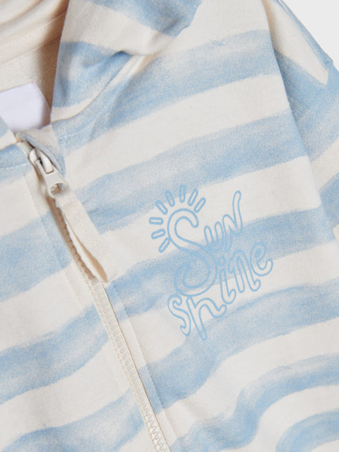 Blue and white striped garment with 'Sunshine' embroidery on a white background