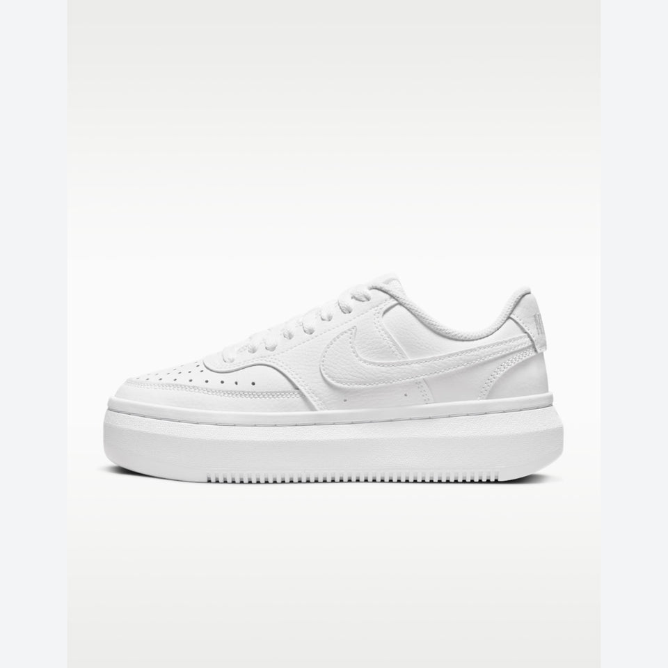 A white Nike Air Force 1 Low sneaker with a chunky platform sole, shown from a side profile view against a clean white background.