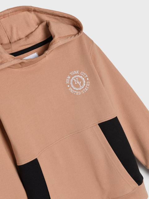 Brown hoodie with a logo on a white background