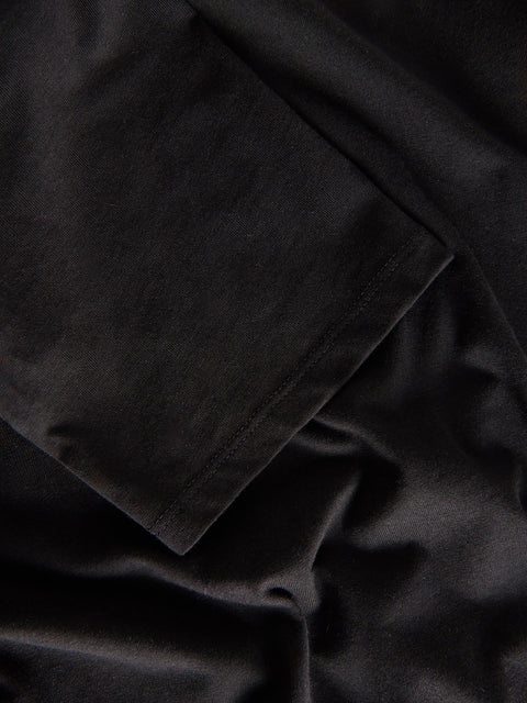 Close-up of black fabric with a pocket