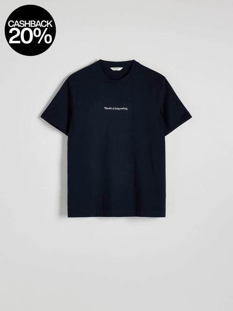 Black t-shirt with white text on a light gray background