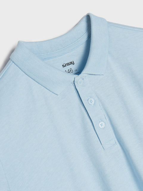 Light blue polo neck shirt with 'Sainsbury's' branding on a white background