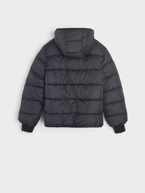Black puffer jacket on a light gray background