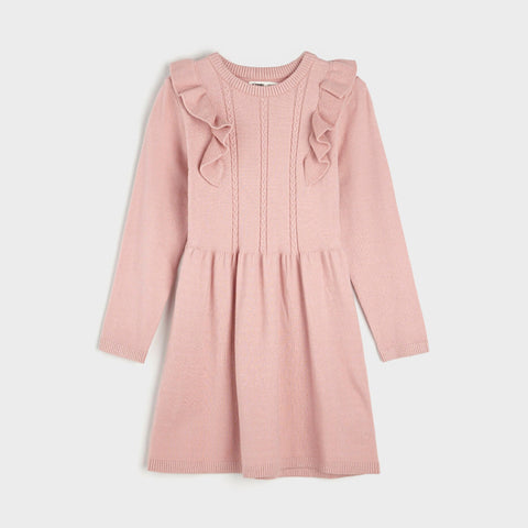 Pink dress with ruffled details on a light gray background