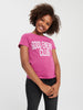 Young girl wearing a pink 'Good Energy Club' t-shirt on a white background
