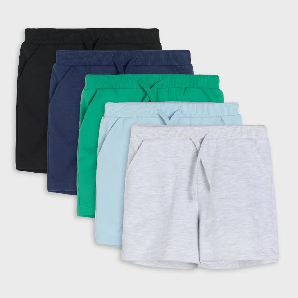 Five pairs of kids' drawstring shorts in different colors (black, navy, green, light blue, and heather gray) arranged in a fan shape on a light gray background.