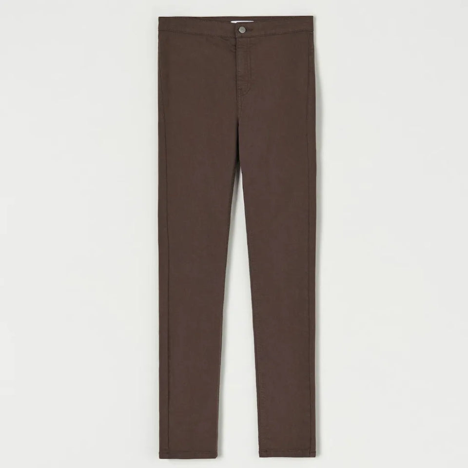 A pair of slim-fit brown trousers shown flat against a light gray background.