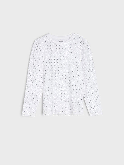 White long-sleeve shirt with subtle pattern on a light gray background