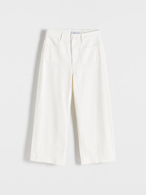 White pants on a light gray background