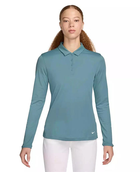 Woman wearing a teal long-sleeve polo shirt with a Nike logo on a white background