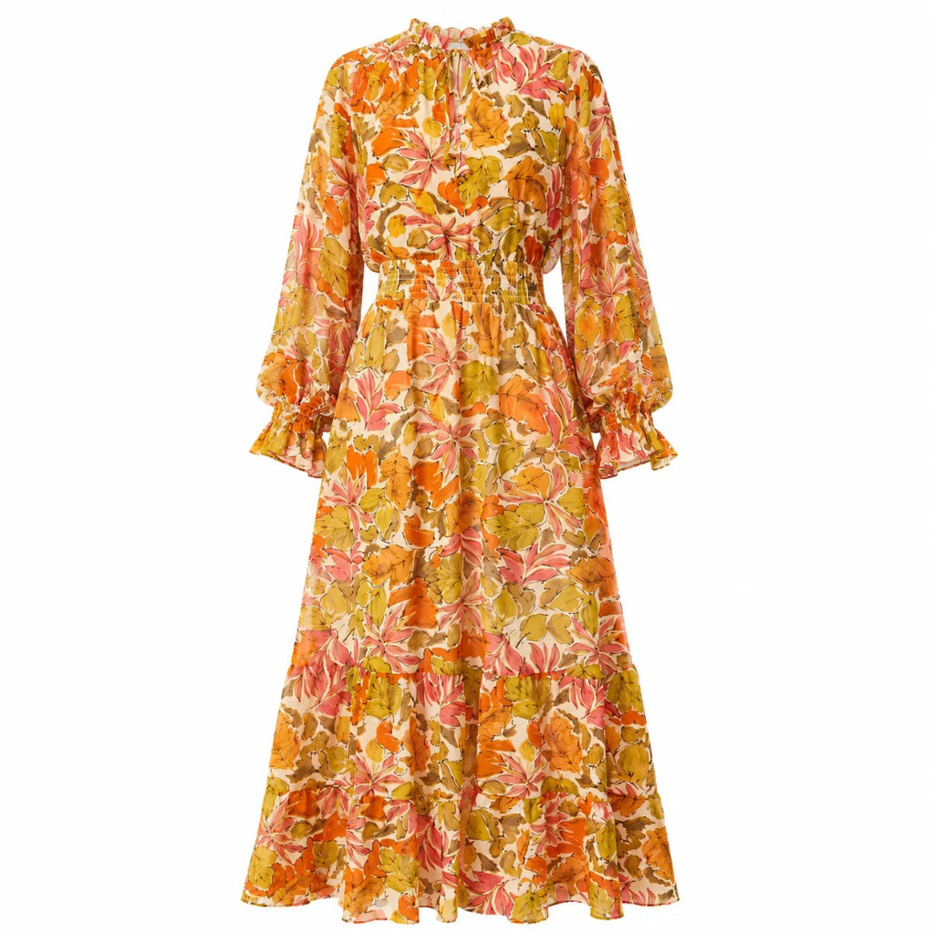 A long-sleeved midi dress with a vibrant orange, yellow, and pink floral print, featuring a gathered waist and ruffled cuffs, shown against a plain white background.