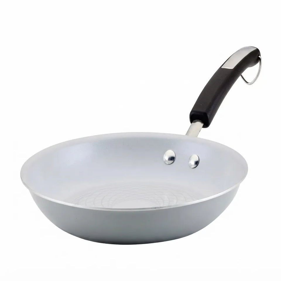 A light gray aluminum frying pan with a black and silver handle, shown on a solid white background.