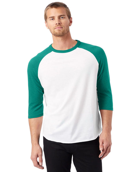 Man wearing a white baseball shirt with green sleeves on a white background