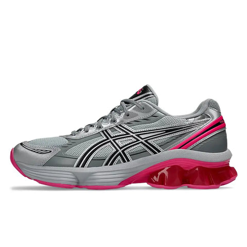 Gray and pink running shoe on a white background