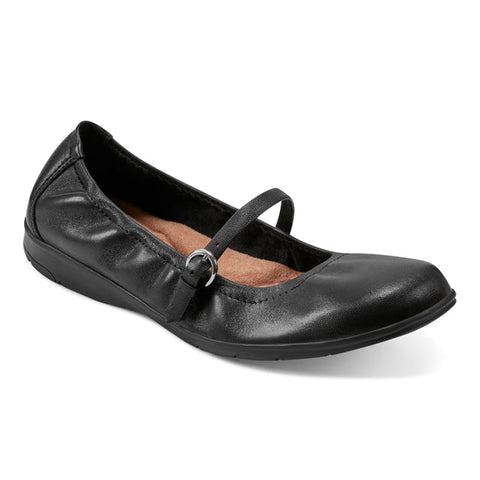 Black leather ballet flat with a strap on a white background