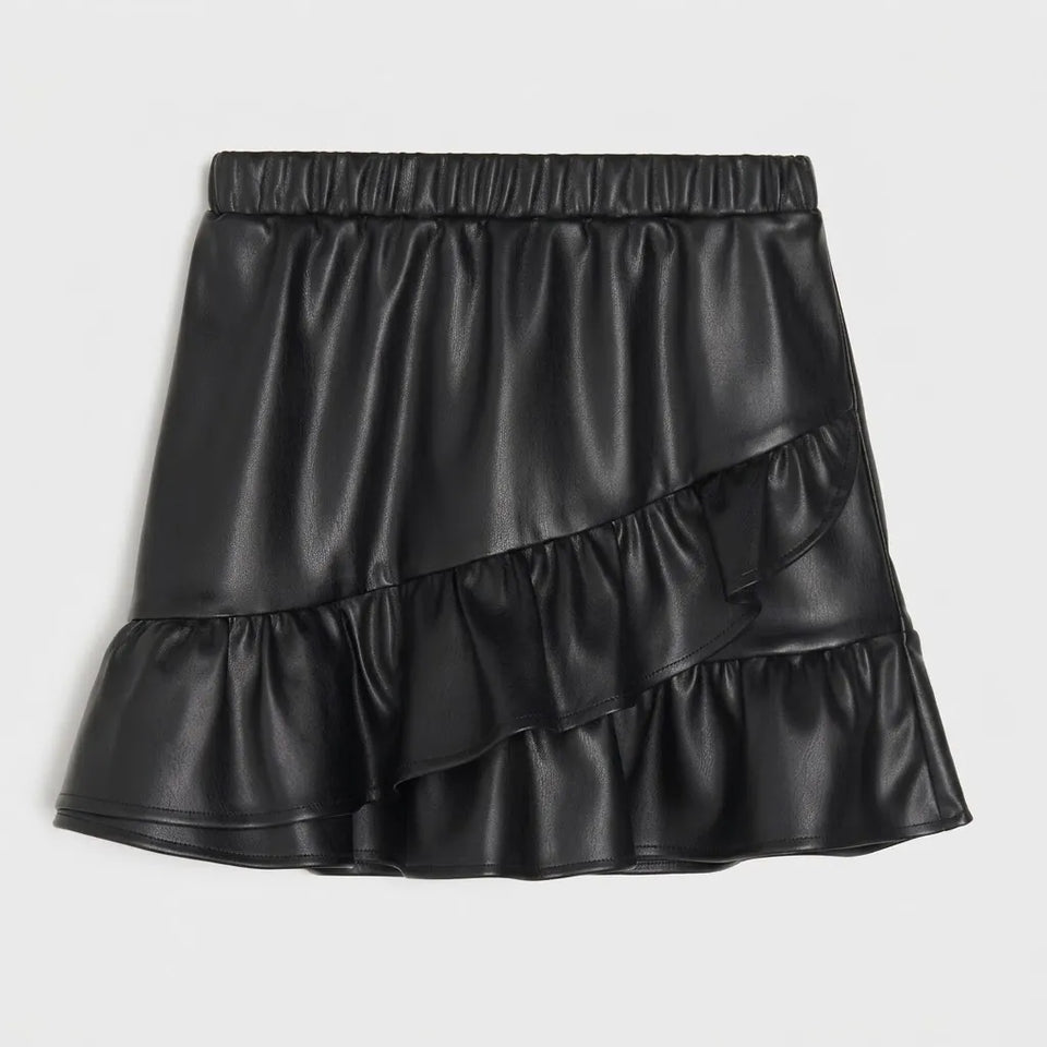A black faux leather mini skirt with an elastic waistband and layered ruffle details, shown flat on a light gray background.