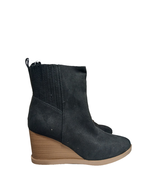 Black wedge ankle boot on a white background