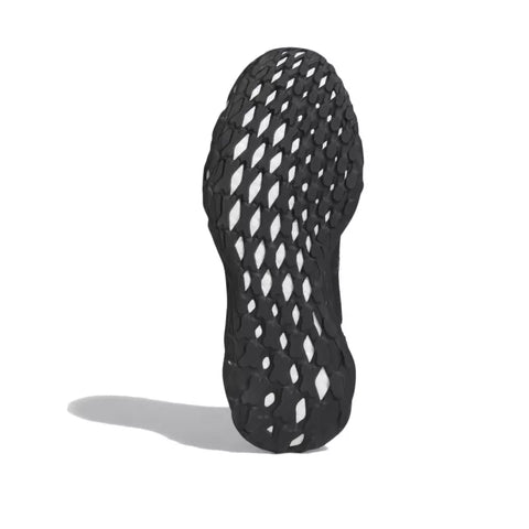 Black shoe sole with textured pattern on a white background