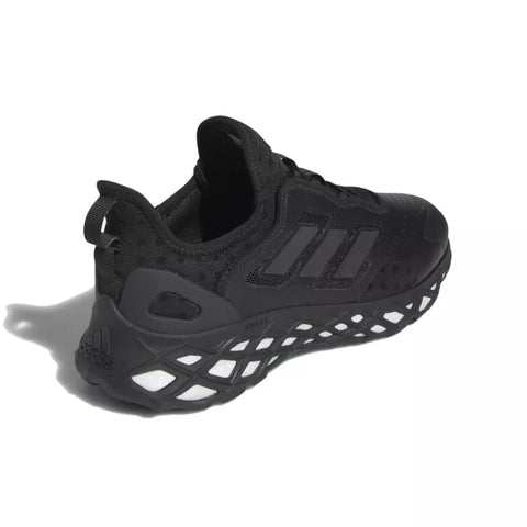 Black Adidas sneaker on a white background
