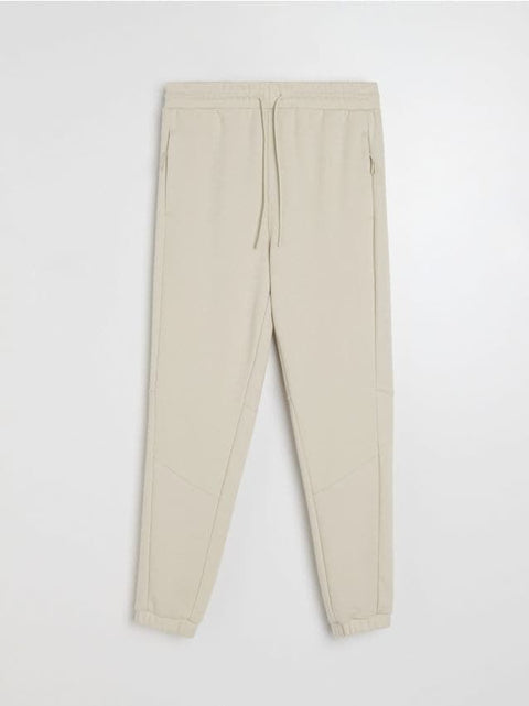 Beige pants on a white background