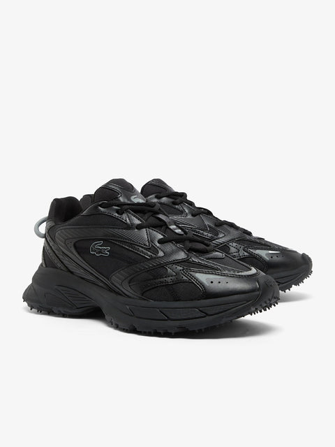 Three black sneakers arranged in a row on a white background