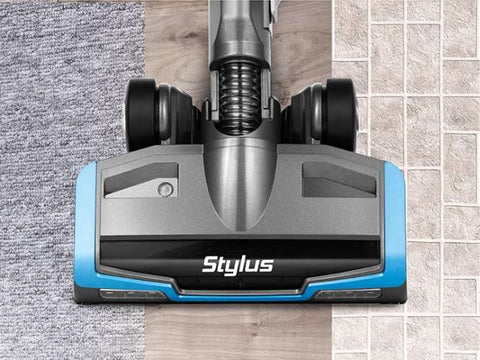 Stylus vacuum cleaner head on a tiled floor